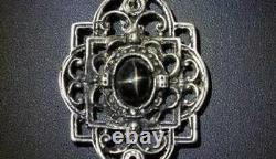 Beautiful Victorian style sterling silver pendant with black star sapphire