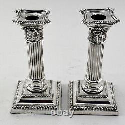 Pair of Late Victorian Sterling Silver Corinthian Style Candlesticks