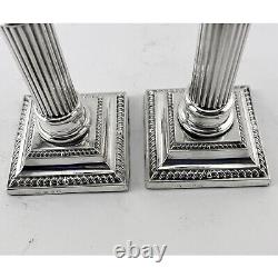 Pair of Late Victorian Sterling Silver Corinthian Style Candlesticks